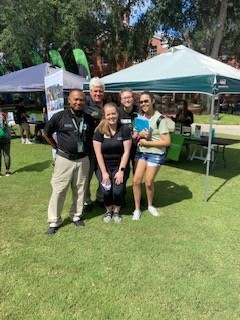 A small Public Safety group photo at an on campus event.